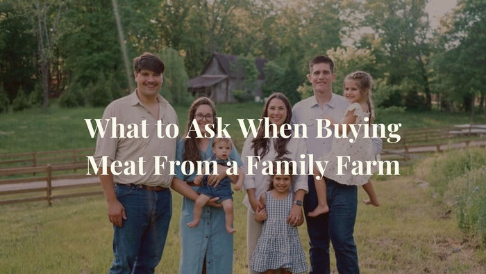 The Parker and Kennedy families of p&k family farms standing in the pasture field 